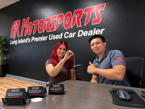 Reviewing financing options at AR Motorsports
