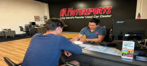 Inside the AR Motorsports showroom in Bay Shore, NY